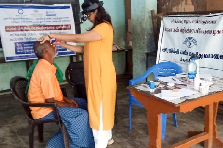 Patient undergoing eye check-up in Free Eye Check-up Camp at Sankarankovil