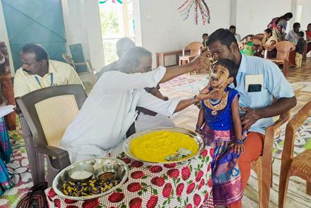 Sri Ayyappan Ji doing Vidyarambham for a child at VKV Vallioor